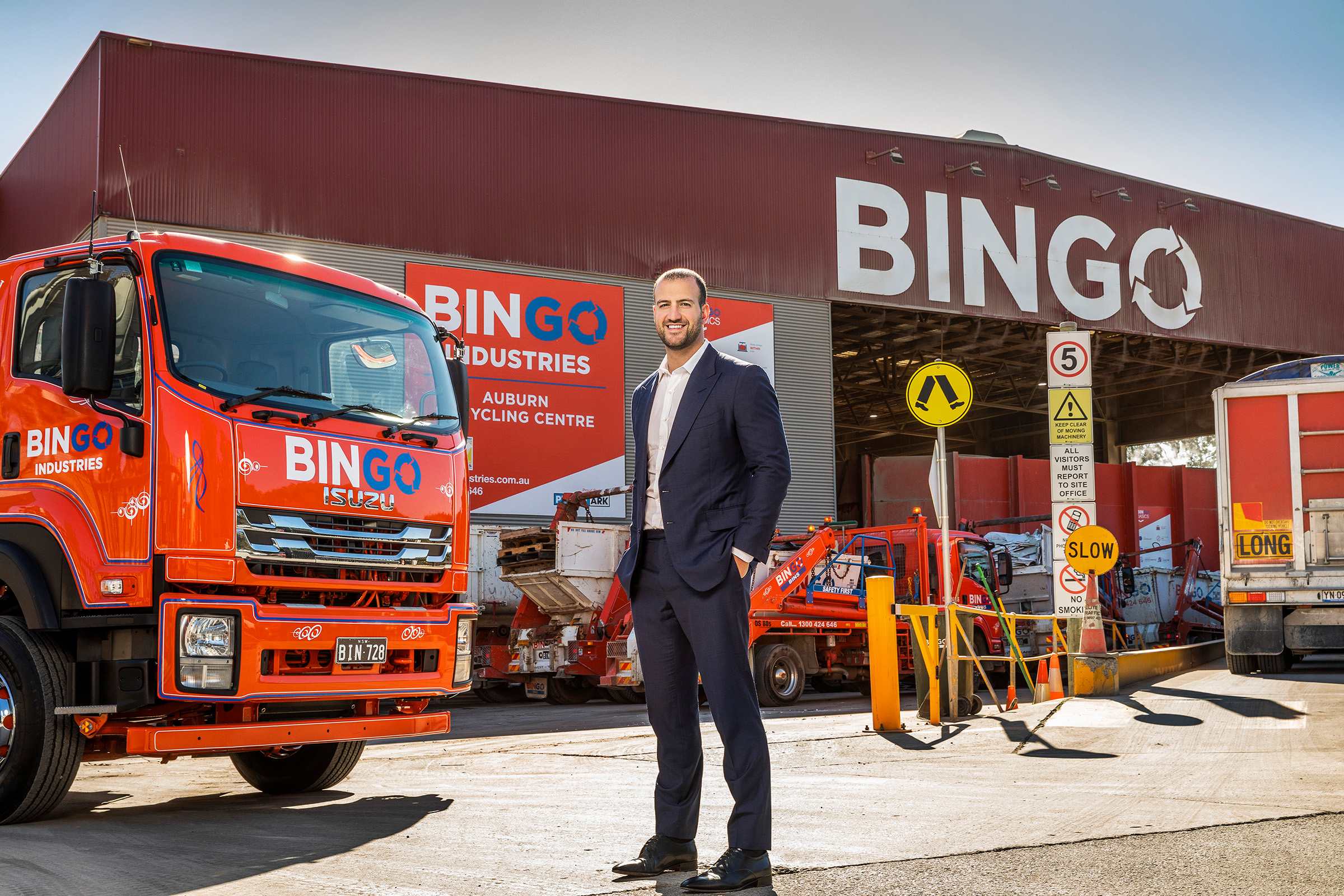 Corporate editorial location CEO photography Daniel Tartak BinGo recycling centre and truck background